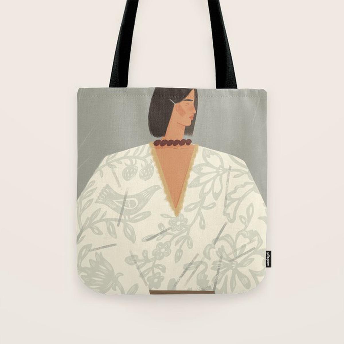 portrait of a fragile woman in a white embroidered shirt on a blue background Tote Bag